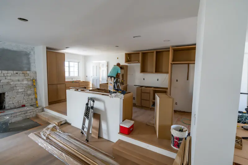 Kitchen cabinets going in around the new island